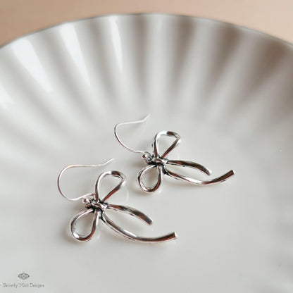 Silver Bow Drop Earrings, Dainty Ribbon Charm, Surgical Steel Hooks, Feminine Minimalist Jewelry, Sensitive Ear & Clip-On Options